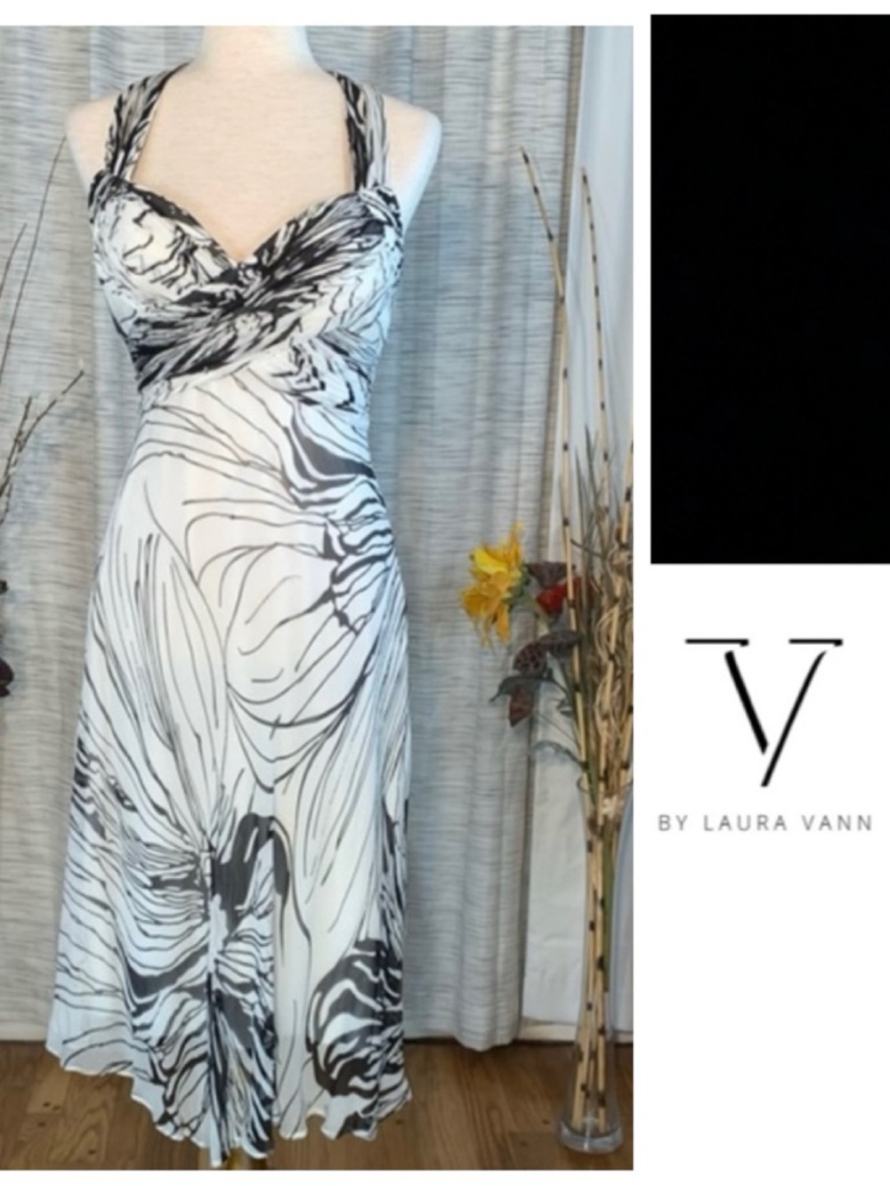 Laura Vann white with black flowers halter A-line dress.